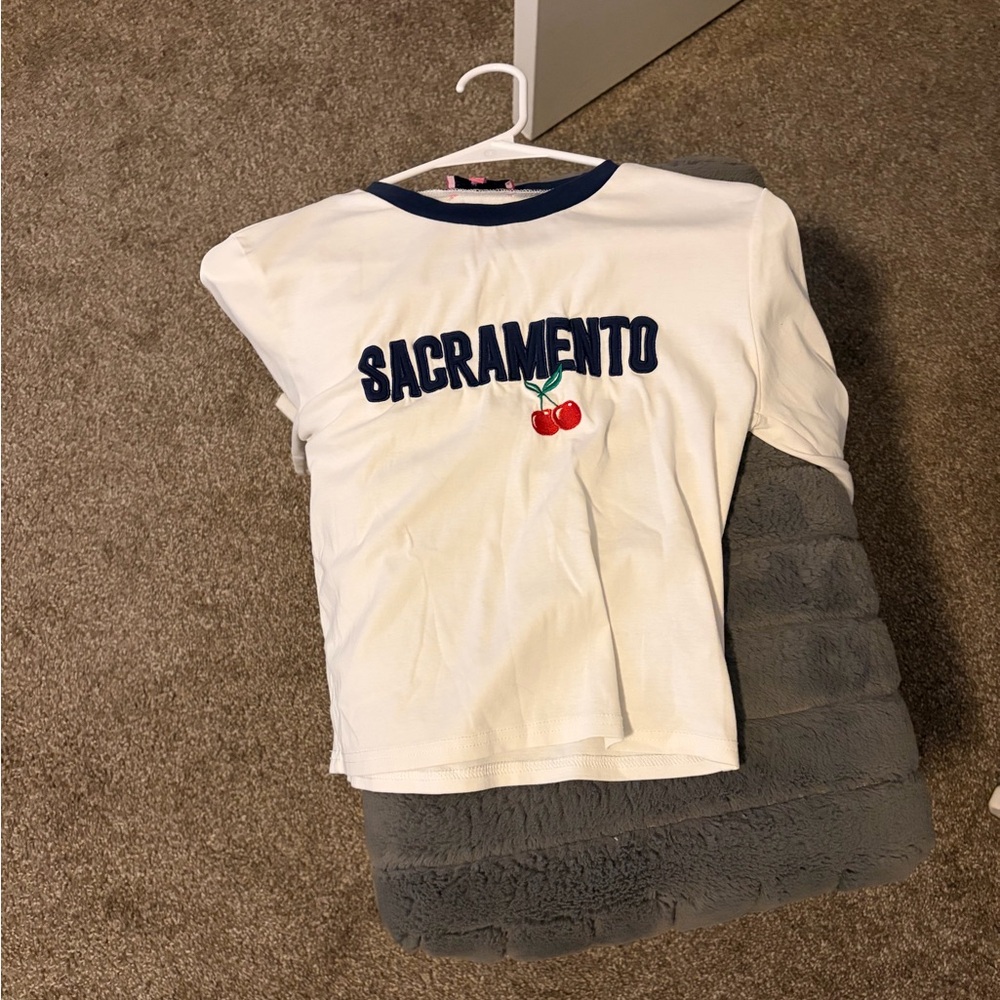 Edikted White Tee with Blue Accents and Cherry Motif